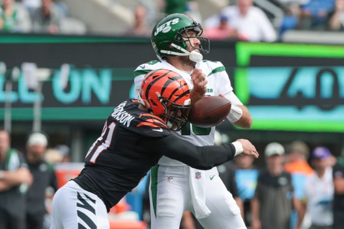 Cincinnati Bengals defensive end Trey Hendrickson (91) forces a fumble by New York Jets quarterback Joe Flacco (19). Mandatory Credit: Vincent Carchietta-USA TODAY